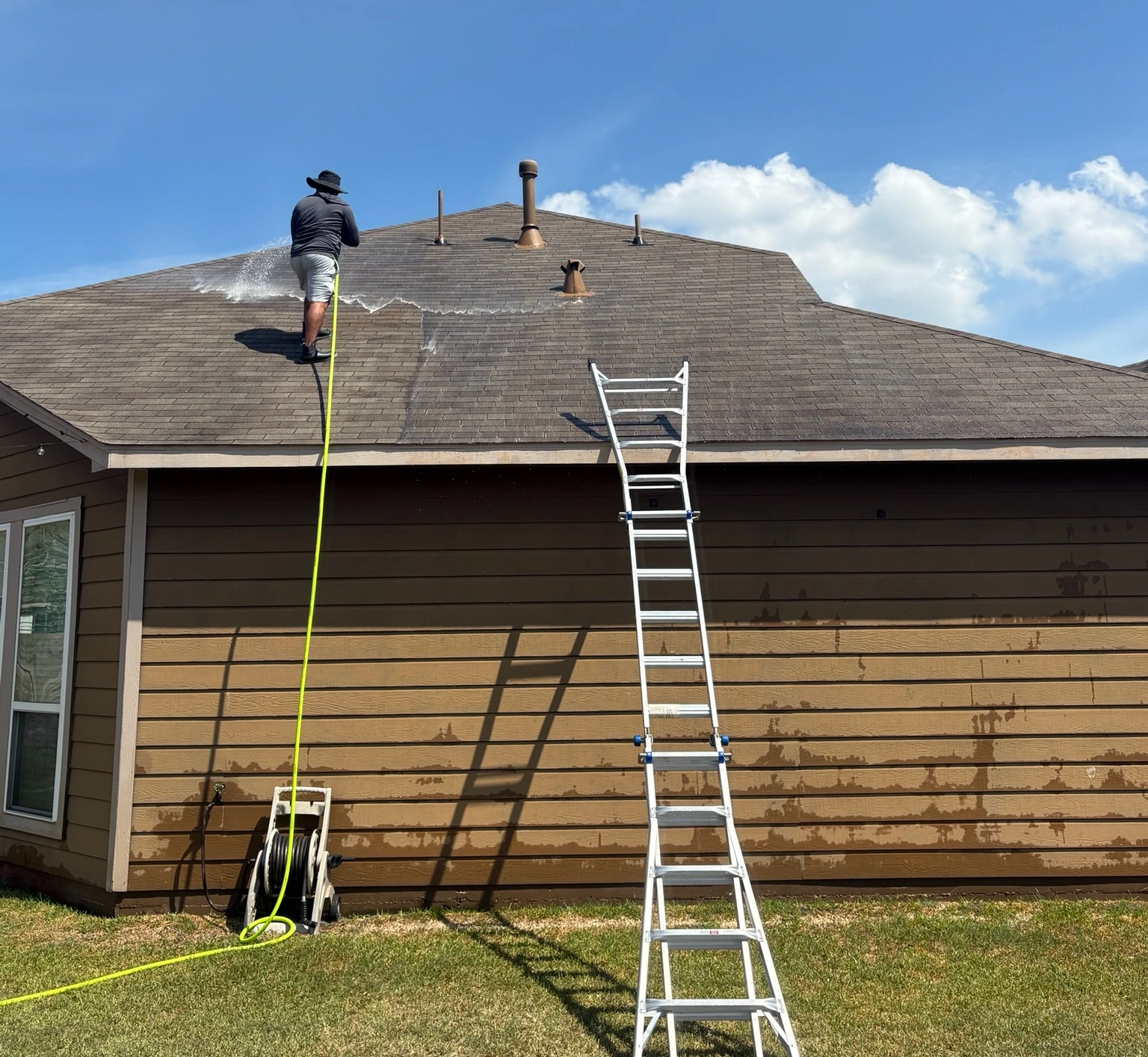 Space City roof washing in progress