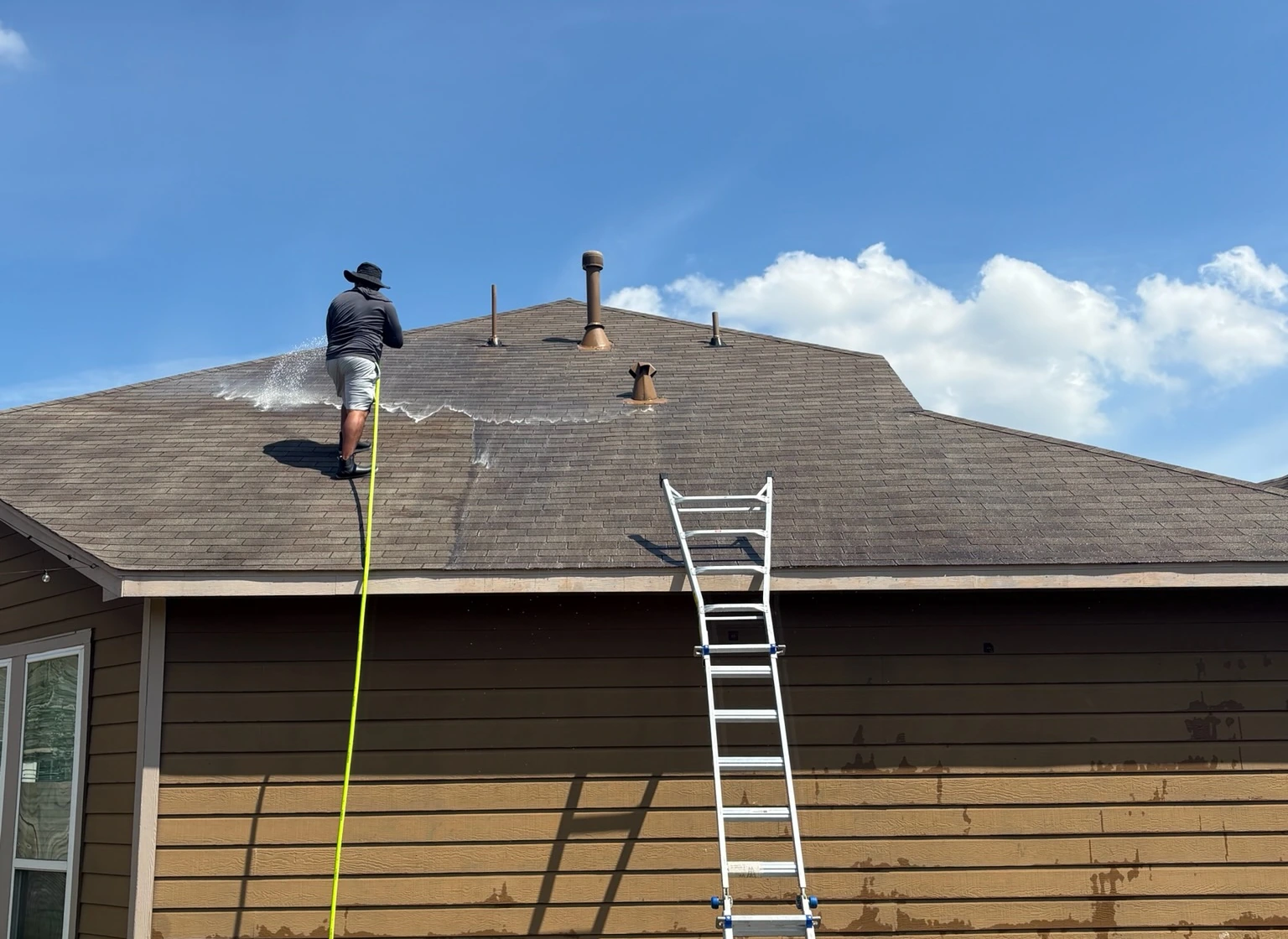 Space City roof washing in progress